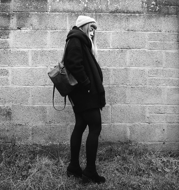 black winter outfit : being little. black wool raw edge coat cos minimal black monochrome fashion blog blogger outfit