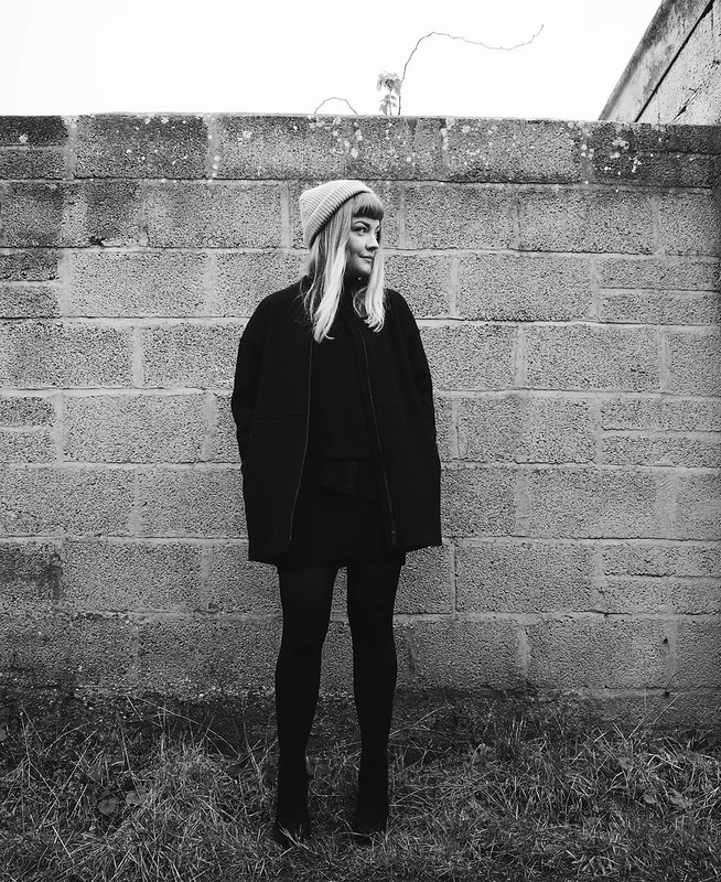 black winter outfit : being little. black wool raw edge coat cos minimal black monochrome fashion blog blogger outfit