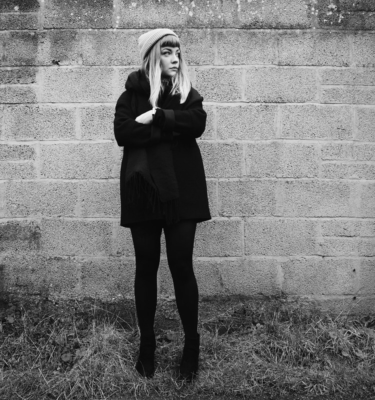 black winter outfit : being little. black wool raw edge coat cos minimal black monochrome fashion blog blogger outfit