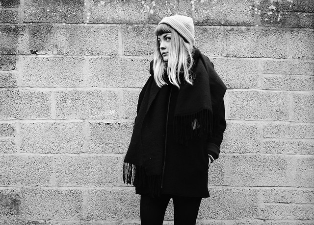 black winter outfit : being little. black wool raw edge coat cos minimal black monochrome fashion blog blogger outfit