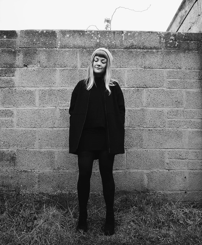 black winter outfit : being little. black wool raw edge coat cos minimal black monochrome fashion blog blogger outfit