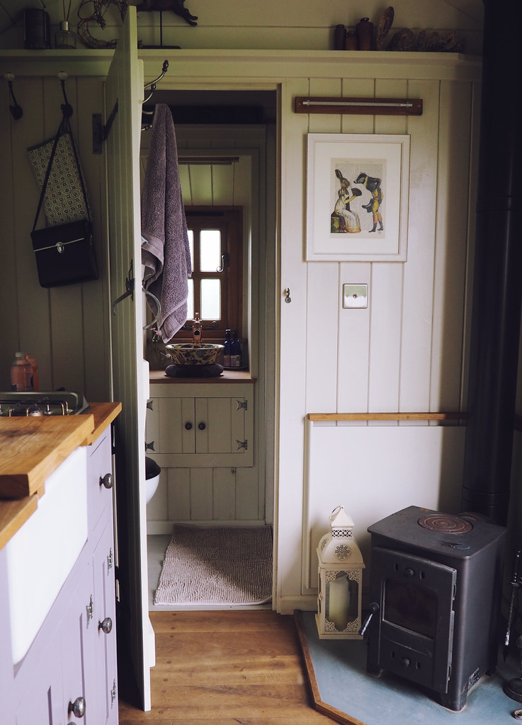 Plankbridge Shepherd's Hut, Colber Farm Plankbridge Shepherd's Hut, Colber Farm Happy Hare, canopy and stars, being little bristol travel lifestyle blog blogger lyzi hut interior wood burner