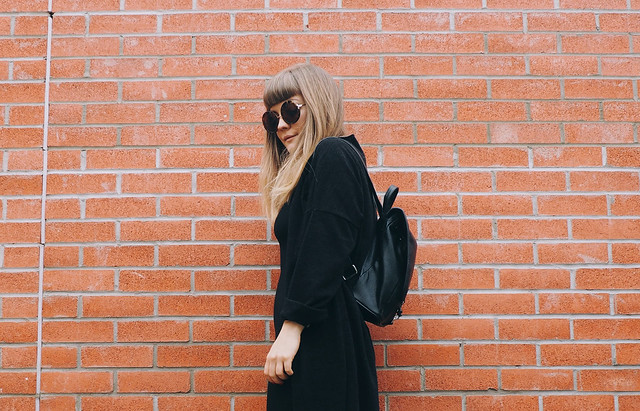 black spring outfit : being little. all black monochrome minimal spring summer outfit lyzi unwin being little british uk bristol fashion lifestyle blog blogger zara sandals H&M bodycon dress mango cardigan monki leather backpack forever 21 round sunglasses freedom to exist fte watch