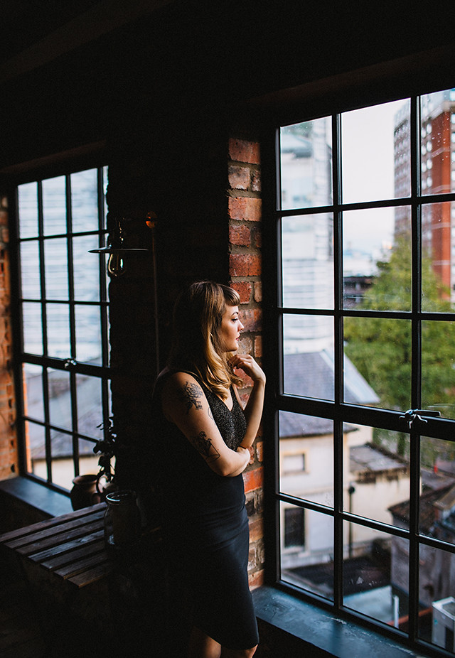 Lyzi Unwin at The Forge, Bristol. Photographed by Lauren Jayne Hall. lyzi unwin being little the forge bristol lauren jayne hall photographer tattoos rose rebecca vincent brick wall red lips